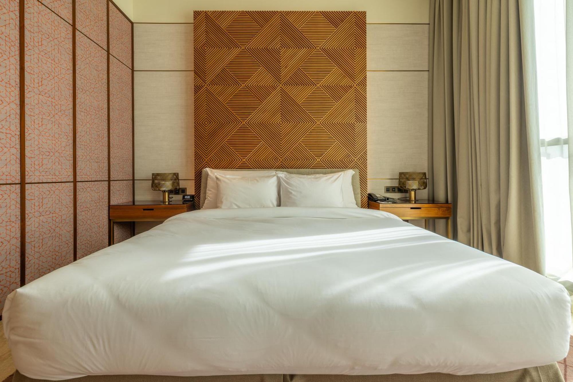 Shirvan Hotel City Yard Джедда Экстерьер фото A bed
